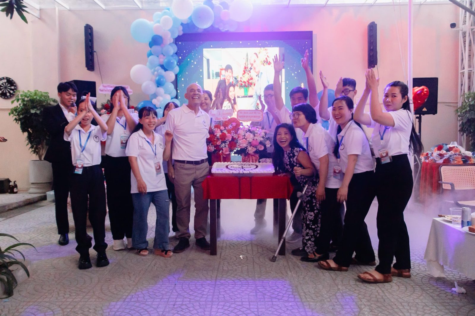 The Happy Heart team celebrating the cafe's 10th anniversary